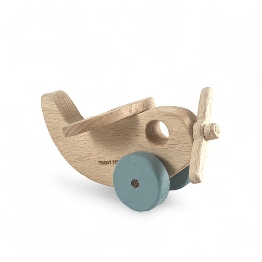 Handcrafted beechwood airplane toy with vibrant wheels in sage green, teal blue, mustard yellow, and pink blush, designed to inspire imaginative play and engage toddlers' senses with its perfect size and eco-friendly materials.
