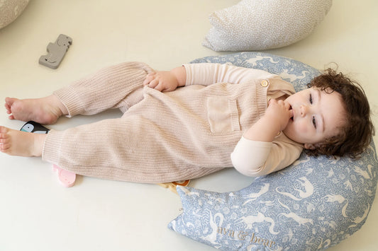 Ava & Bear Crescent nursing cushion for a blog about the benefits of nursing cushions
