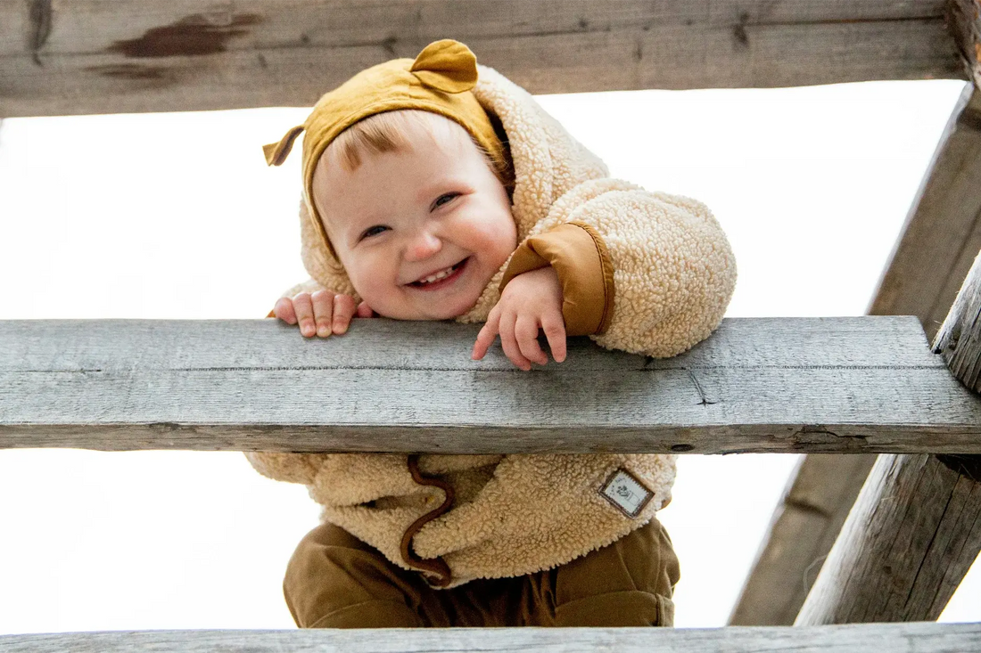 Baby smiling - this is related to massage for baby gums