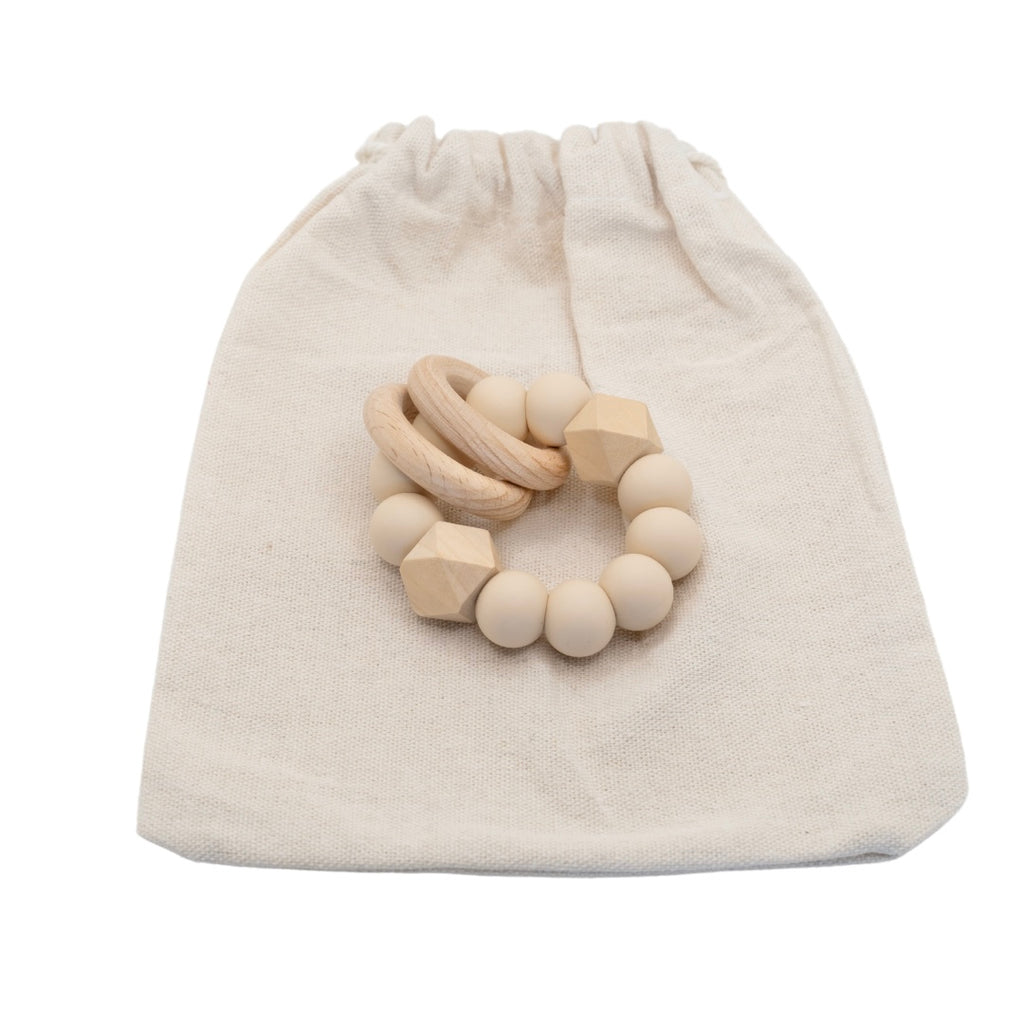 Ava & Bear Teether Toy and Dummy Clip Set featuring a handcrafted design with safe, BPA-free materials, showcasing a soothing silicone and wood texture perfect for easing teething discomfort, with a durable nylon cord for added resilience.