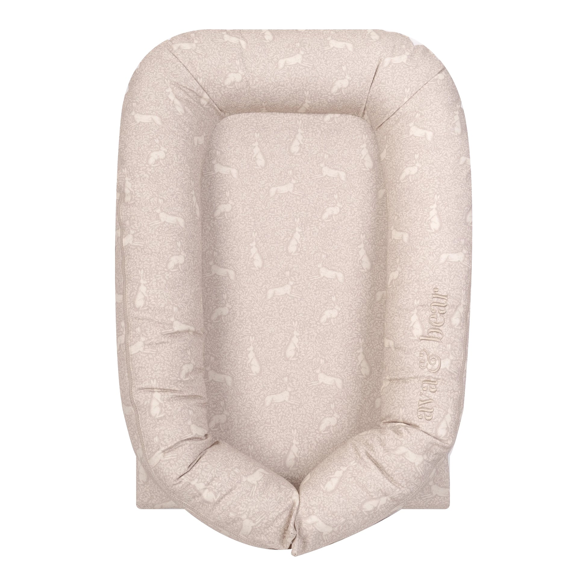 Ava & Bear's Meadow Rabbit Lounging Pod, featuring a 100% Cotton Twill fabric and waterproof base, offers ultimate comfort and versatility for your little one's playtime and tummy-time activities. Proudly made in South Africa, this eco-friendly lounging pod includes a full-edge zip and self-fabric strap closure for easy maintenance and adaptability, making it a perfect choice for busy moms seeking a nurturing and sustainable haven for their baby.