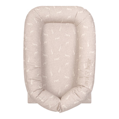 Ava & Bear's Meadow Rabbit Lounging Pod, featuring a 100% Cotton Twill fabric and waterproof base, offers ultimate comfort and versatility for your little one's playtime and tummy-time activities. Proudly made in South Africa, this eco-friendly lounging pod includes a full-edge zip and self-fabric strap closure for easy maintenance and adaptability, making it a perfect choice for busy moms seeking a nurturing and sustainable haven for their baby.