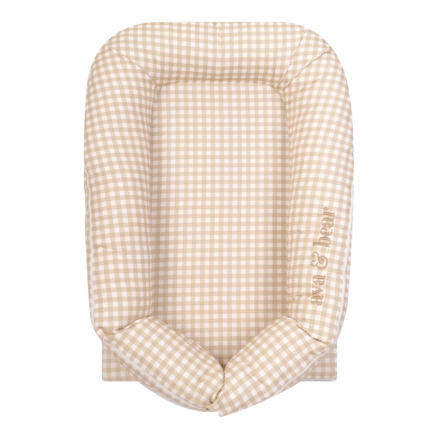 Golden beige gingham lounging pod by Ava & Bear, featuring a 100% cotton twill fabric for softness and durability, with a waterproof base for easy cleanup, perfect for supervised play and tummy time.